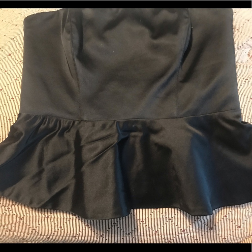 BEBE peplum strapless top.